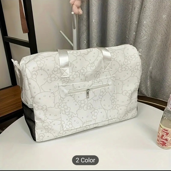 Sanrio Hello Kitty travel bag. Color: White with grey Hello Kitty designs throug - Picture 6 of 13